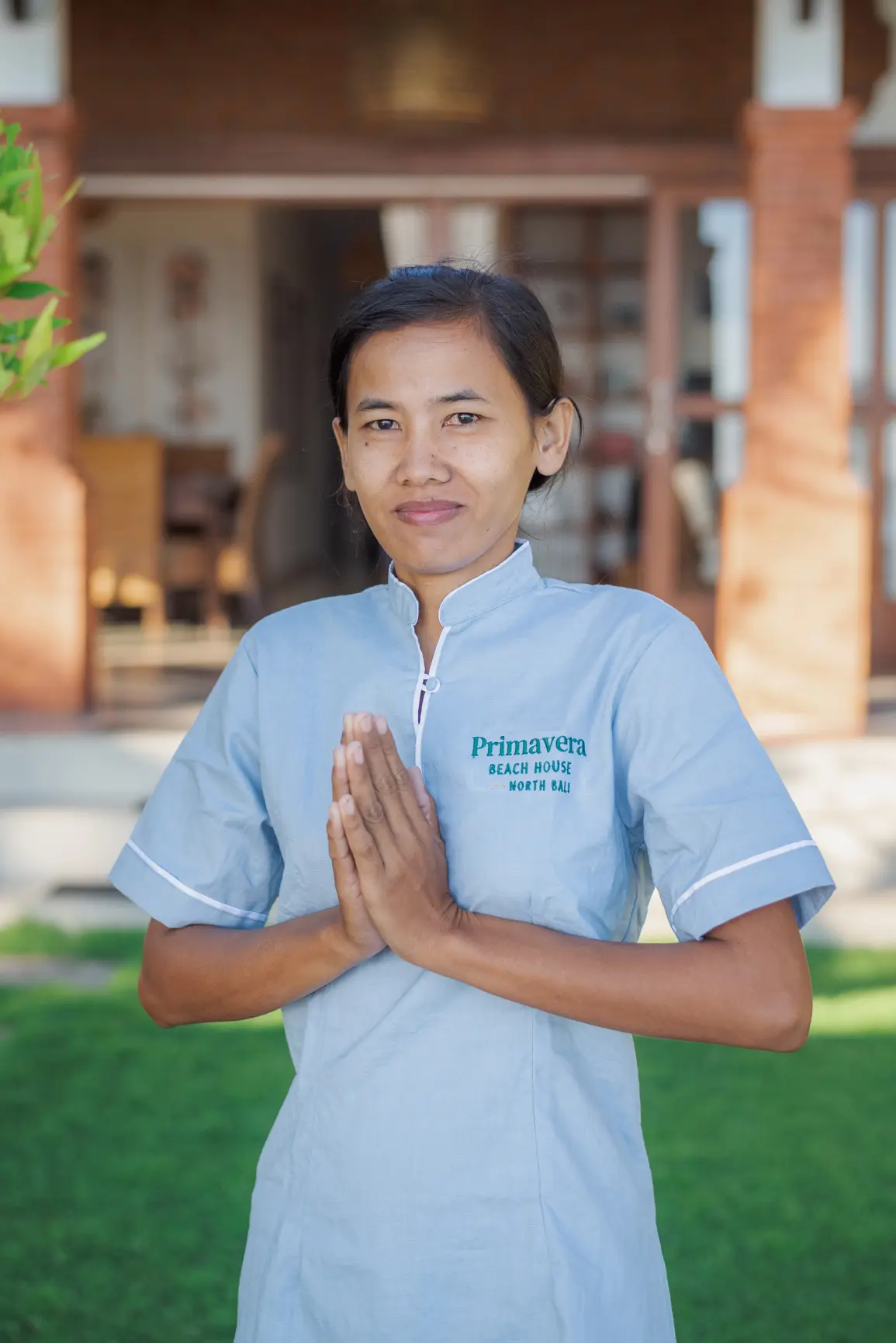 Portrait of Komang, who looks after Primavera Beach House day to day.